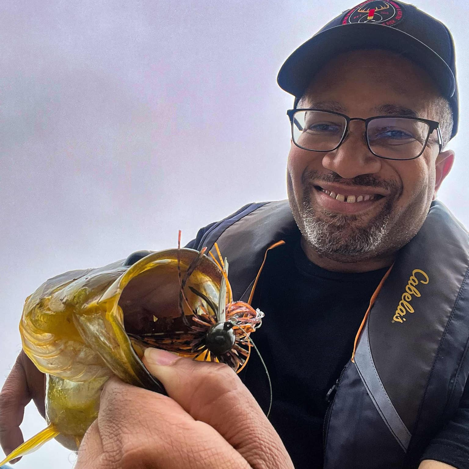 Largemouth bass caught by John Futrell on a Motion fishing Green Pumpkin Orange Finesse Jig