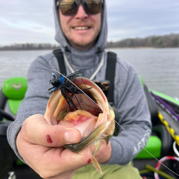 Bass catch on Motion fishing Bruiser Jig and Clutch Craw by angler Austin Ediclk