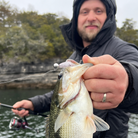 Eddie Timoshchuk Spotted Baas catch using the Purple Shad Motion Minnow