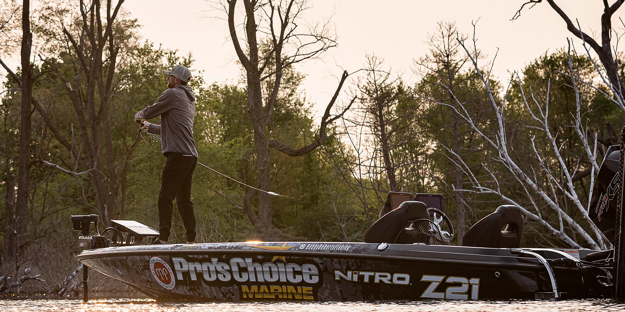 Bobby Roberts Fishing making a cast in a wrapped Nitro Z21 with a Motion fishing and Pros Choice Marine Logo