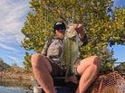 PJ Coley holding his $10,000 big bass from the Eco Fishing Shop Big Bass 250 on Lake of the Ozarks