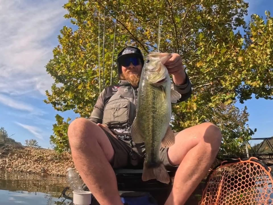 PJ Coley holding his $10,000 big bass from the Eco Fishing Shop Big Bass 250 on Lake of the Ozarks